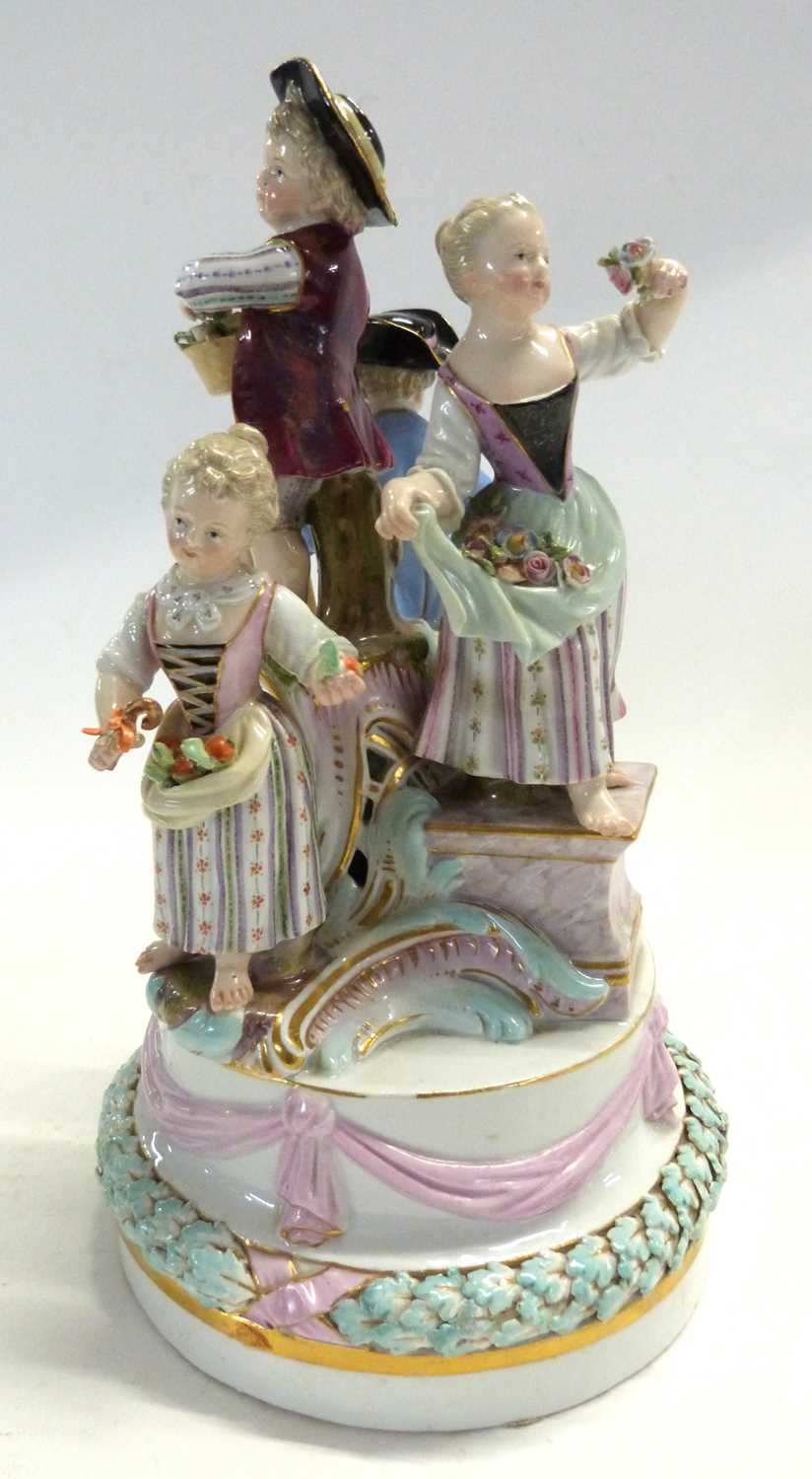 A19th Century Meissen group of children modelled as gardeners and flower sellers on circular base ( - Image 2 of 6