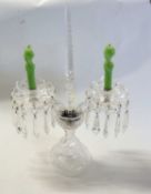 A glass candelabra with two glass sconces and droplets, with a centre glass needle type