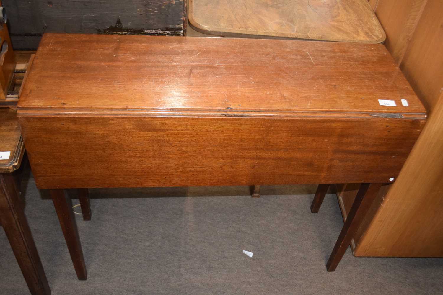 A small 19th Century mahogany drop leaf table, 91cm wide