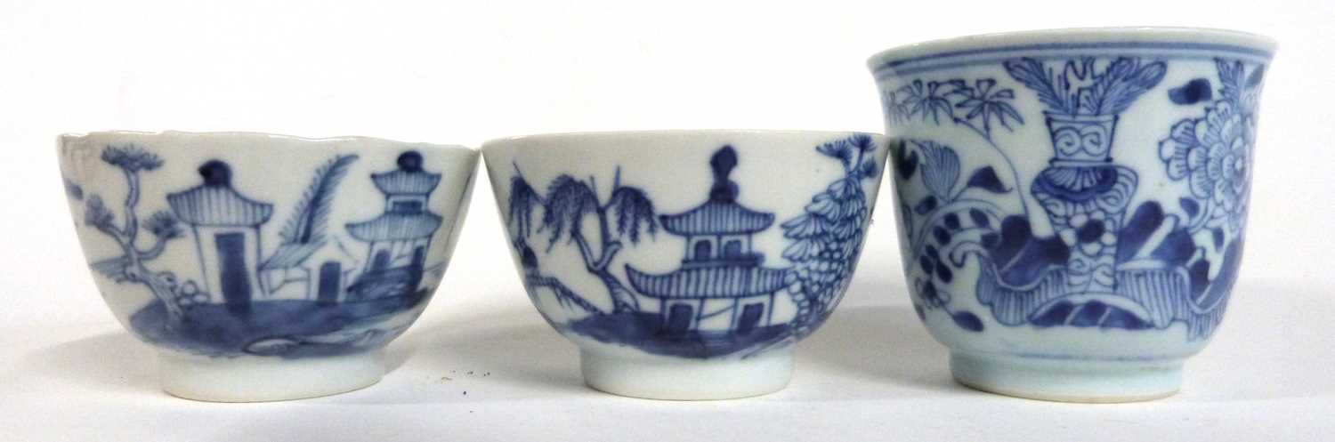 Two Chinese porcelain tea bowls, blue and white decoration, late 18th/early 19th Century together