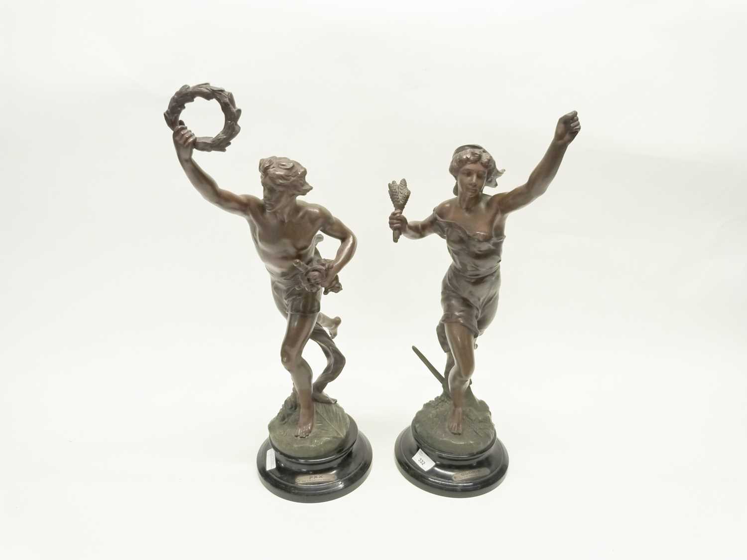 A large pair of Spelter figures on black ebonised bases after J P Germain, Sculpter, one entitled "