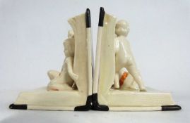 A pair of ceramic Art Deco book ends