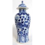 Chinese porcelain vase with blue an white decoration of a phoenix amongst flowers, four character