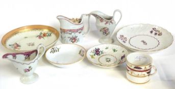 A collection of late 18th Century porcelain wares including New Hall helmet shape jugs, Worcester