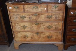 18th Century and later walnut veneered chest with three short over three long drawers, raised on