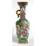 A 19th Century Cantonese porcelain vase of quatrelobe form decorated with Chinese figures (one