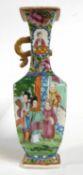 A 19th Century Cantonese porcelain vase of quatrelobe form decorated with Chinese figures (one