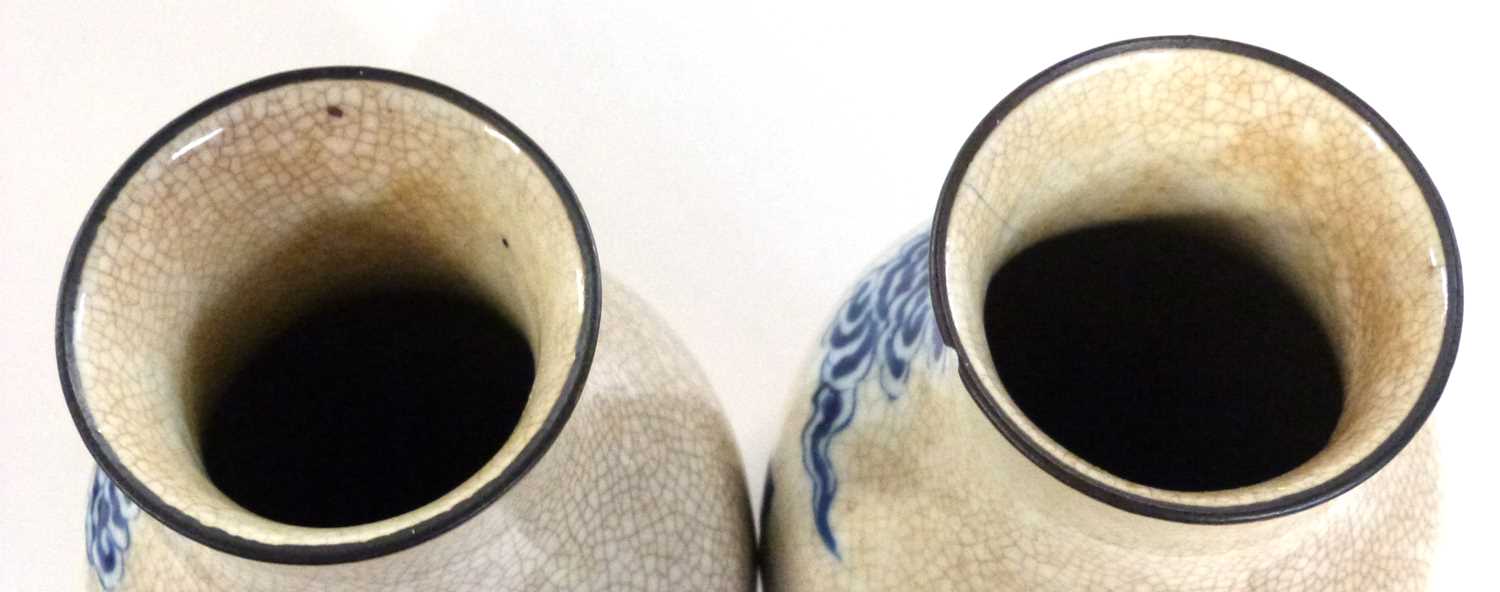 A pair of Chinese porcelain vases, late 19th Century of cylindrical form, the crackle ware ground - Image 6 of 7