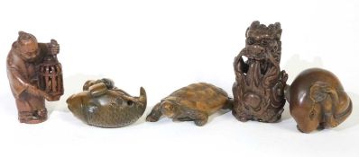 Further group of carved wooden Netsuke including a fish and tortoise