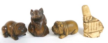 A small plastic bag containing four carved Netsuke, one modelled as a mouse and further modelled