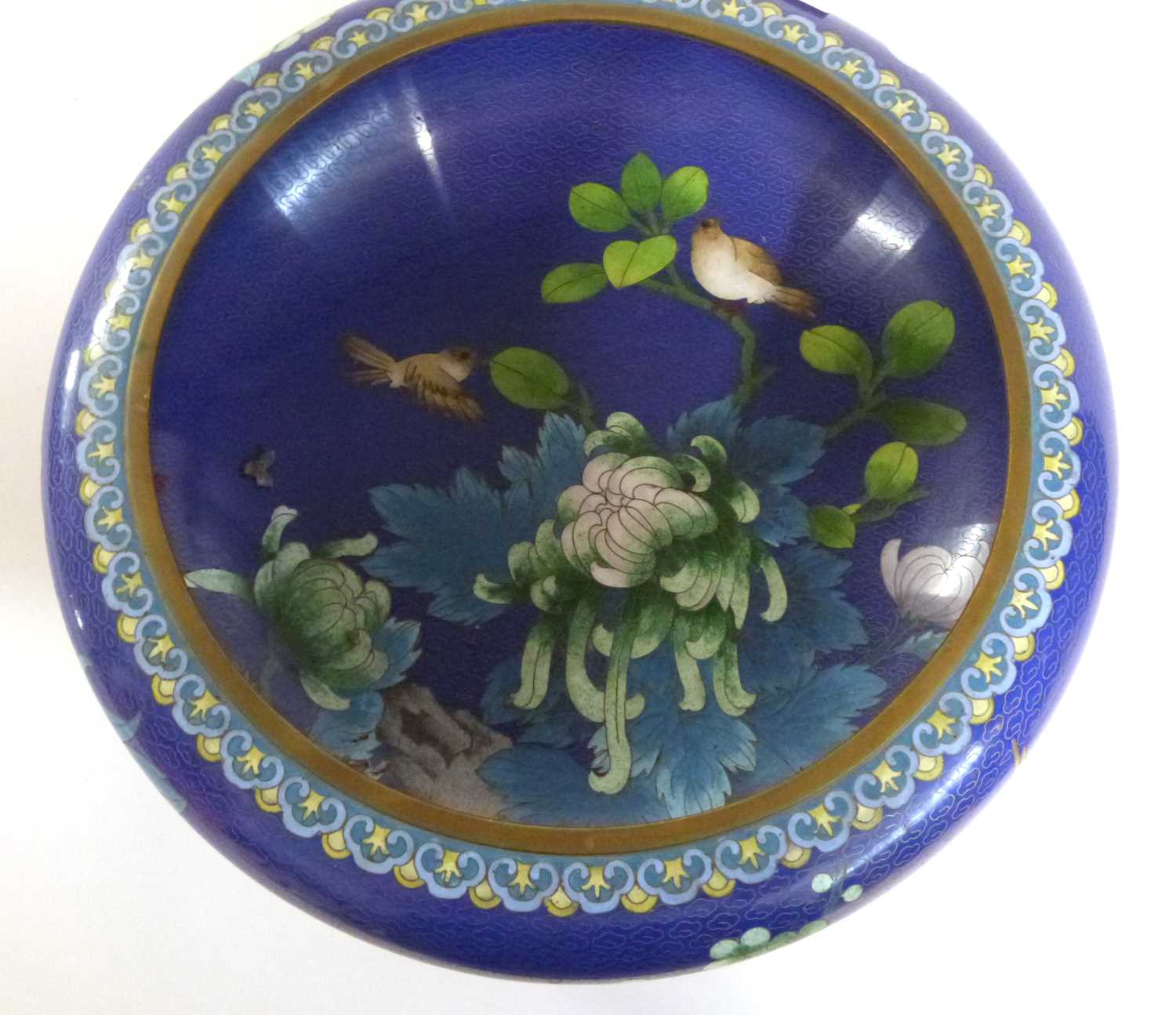 A large Cloisonne bowl, the blue ground finely decorated with flowers and birds, the bowl raised - Image 3 of 4