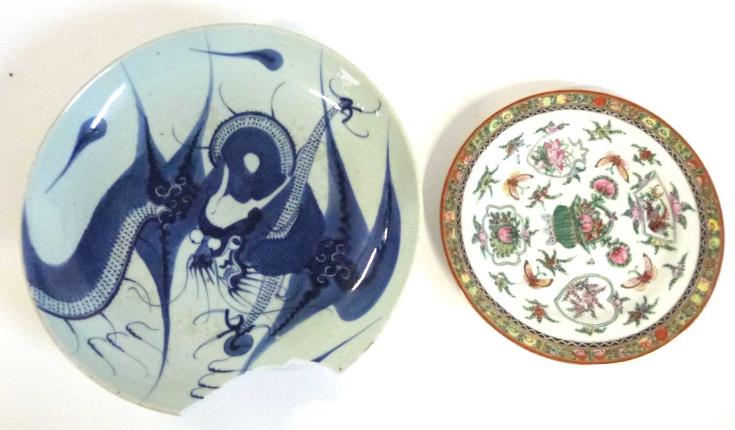 An Oriental porcelain blue and white dish with dragons together with a smaller polychrome decoration