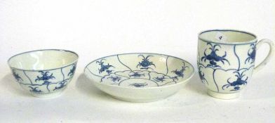 An 18th Century Worcester tea bowl and saucer together with a matching cup, saucer 12cm diameter