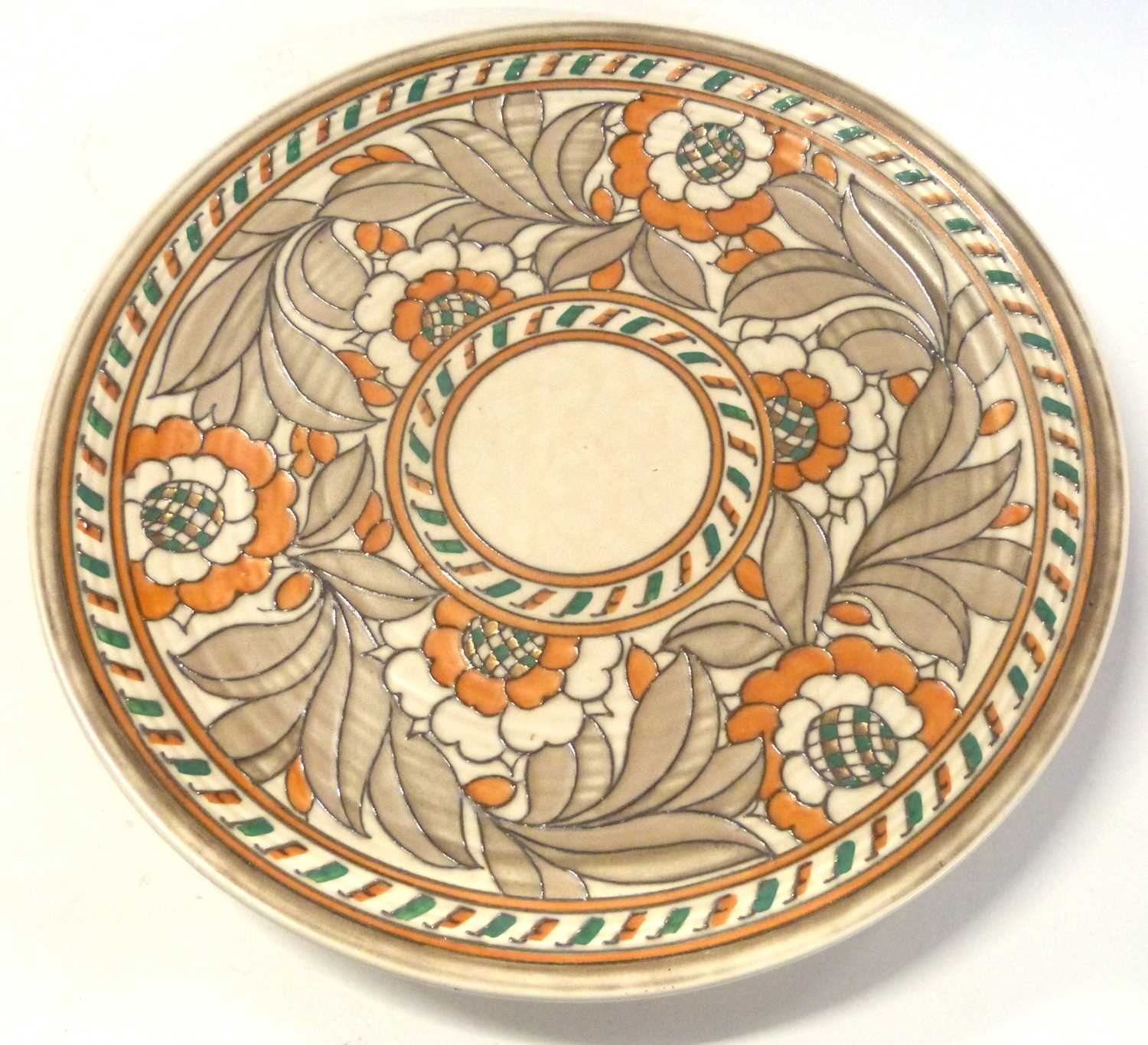 A large Crown Ducal charger by Charlotte Rhead with tube lined design, pattern number 4491, 36cm