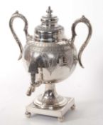 Late Victorian silver plated samovar with twin decorative scroll handles, engraved body and base,