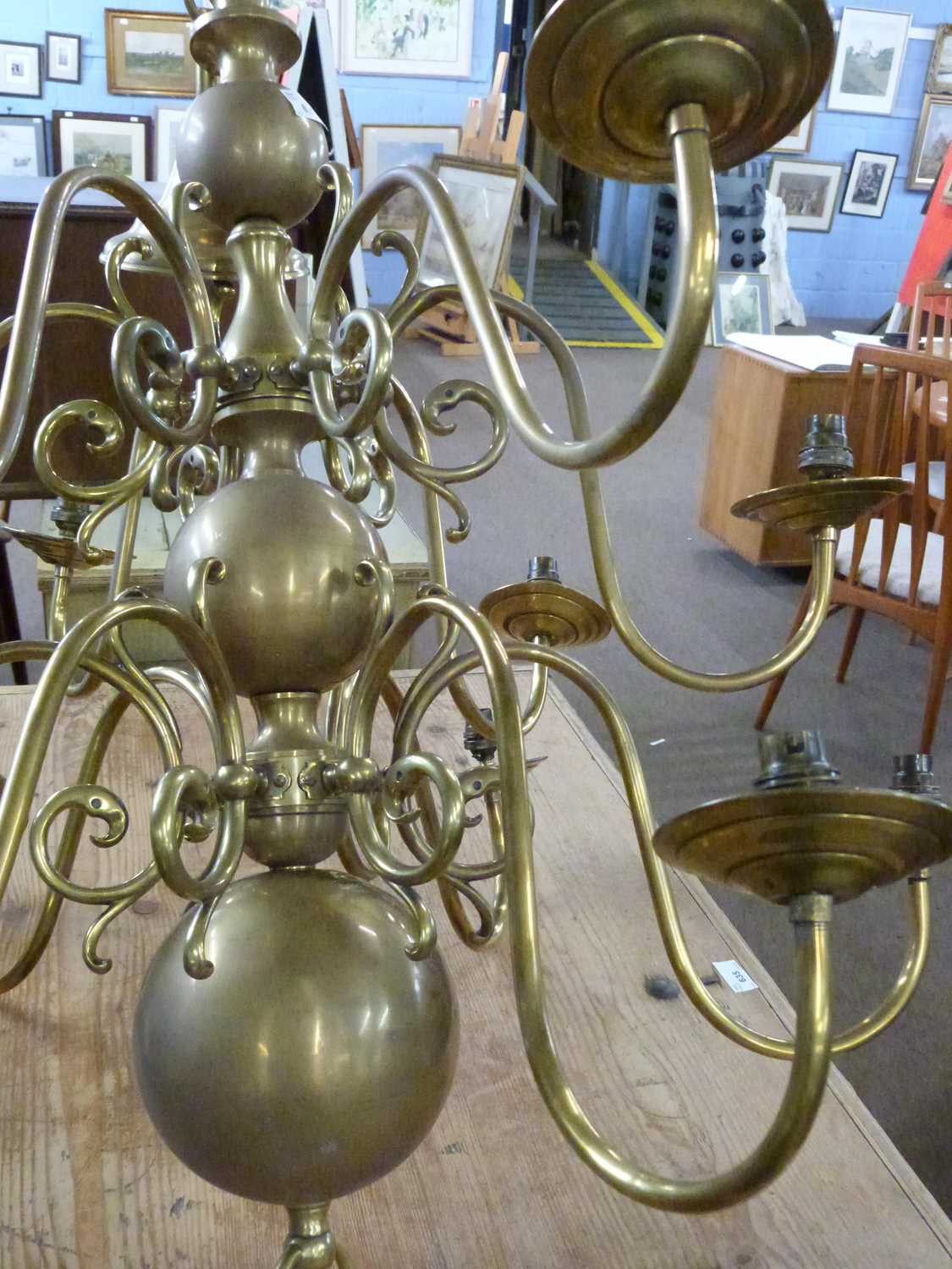 A large reproduction Dutch style brass light fitting, fitted with twelve scrolled arms, approx - Image 5 of 5