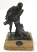 Lead model of Sir Francis Drake mounted on a rectangular stone base with enamel badge for Houses