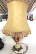 Further table lamp, mounted on gilt base with classical bust to the centre on pale yellow ground