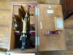 A lacquered brass and steel monocular microscope signed E.Leitz Wetzlar 808922, approx 30cm high,
