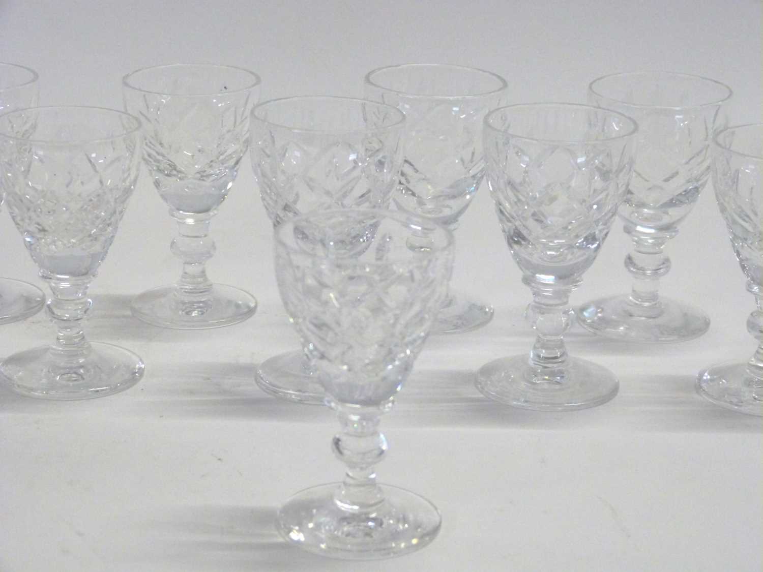 A small cut glass hobnail cut condiment glass and twelve small spirit glasses - Image 2 of 3
