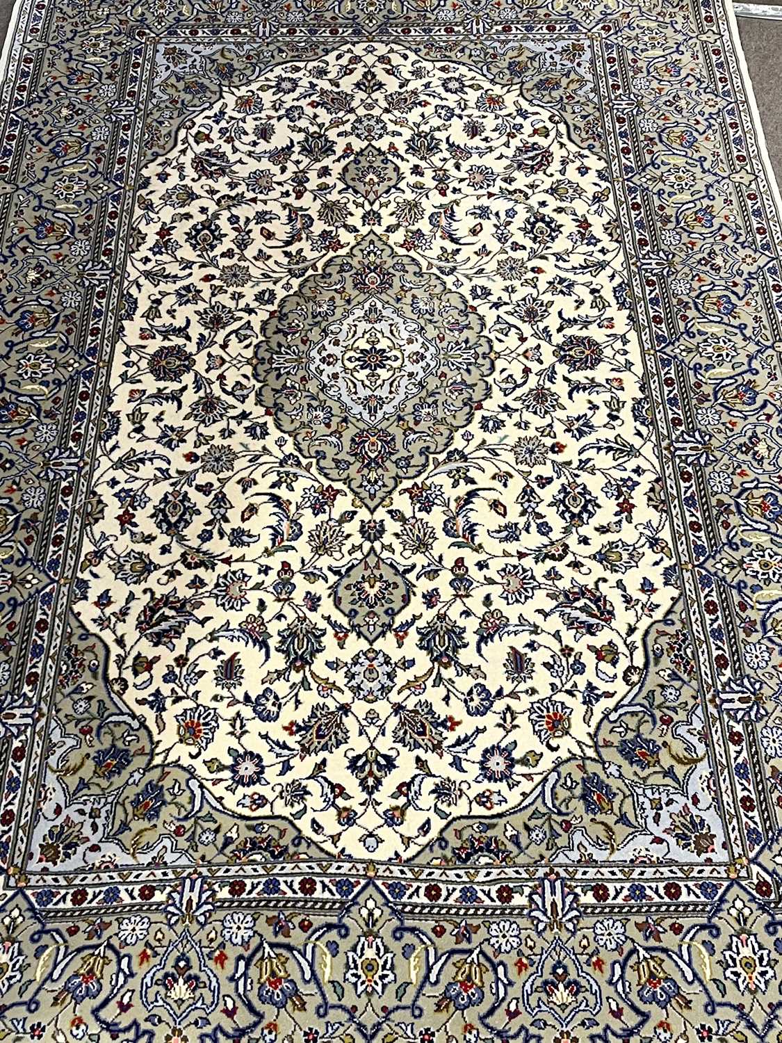 A floral decorated Iranian silk mix floral carpet 140 x 240cm - Image 2 of 4