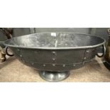 Oval iron pedestal bowl or planter with ringlet handles and studded detail, 52cm wide