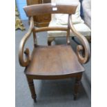 A Victorian hard seated scroll arm chair on turned legs, 50cm wide