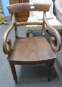 A Victorian hard seated scroll arm chair on turned legs, 50cm wide