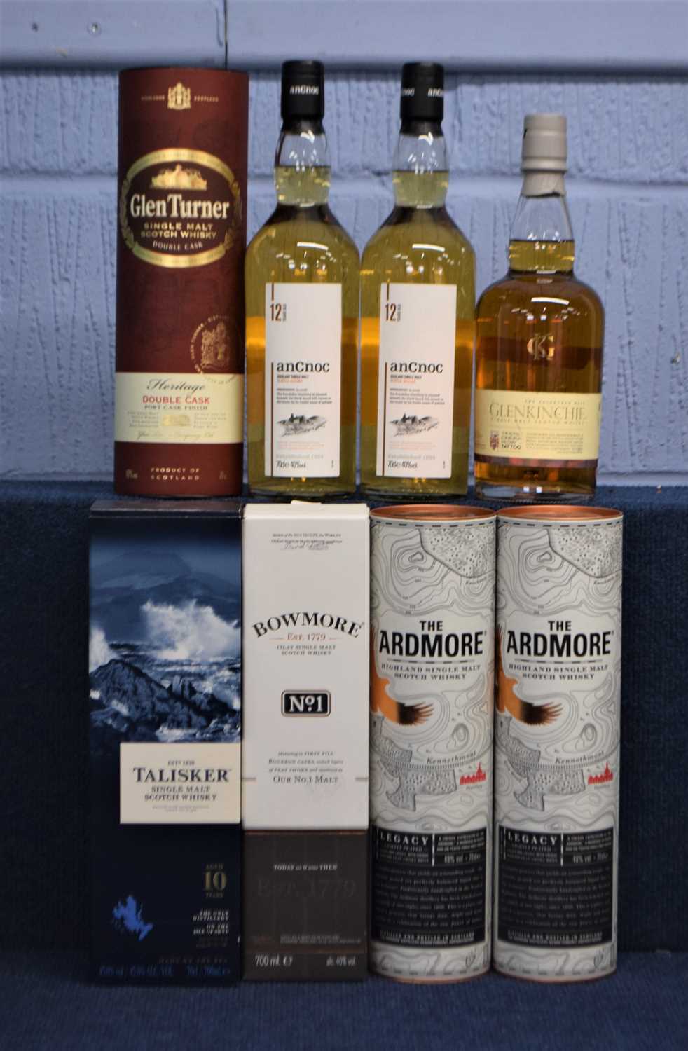 Eight bottles of whisky to include Glenkinchie, Ancnoc, Ardmore, Glen Turner, Tallisker and Bowmore,