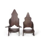 Jack Grimble of Cromer - A pair of ladies and gents oak throne style chairs with arched backs, the