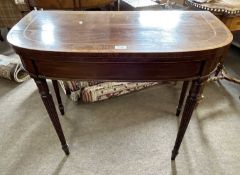 Georgian mahogany and cross banded card table of D form fitted with a baize lined interior, raised