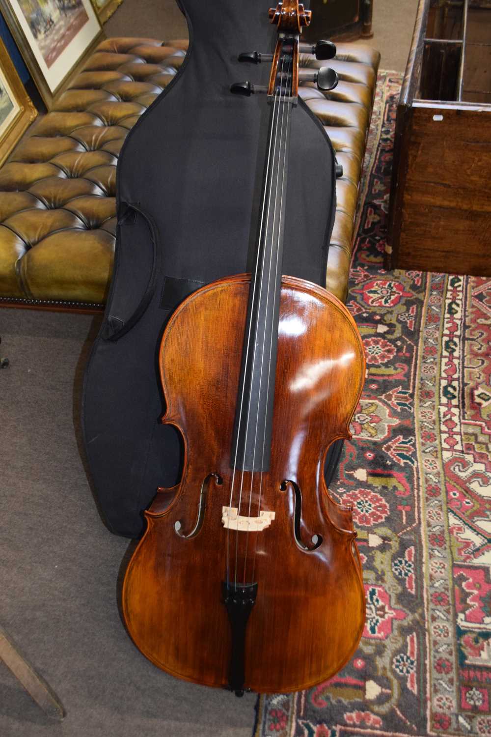 Cello -no makers label apparent - 120 cm long - together with a black travel case. Appears in good