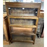 An early 20th Century Gunn four section bookcase cabinet with glazed doors, 87cm wide