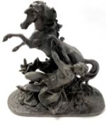 A Spelter figure of a classical scene of galloping horse on oval base
