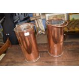 Pair of cylindrical copper buckets with looped handles reputedly fire buckets from the Boar War,