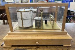 Early 20th Century barograph set in a light oak case with base drawer The clockwork eight-day