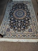 A contemporary Iranian silk mix floral carpet 125x 195 cm