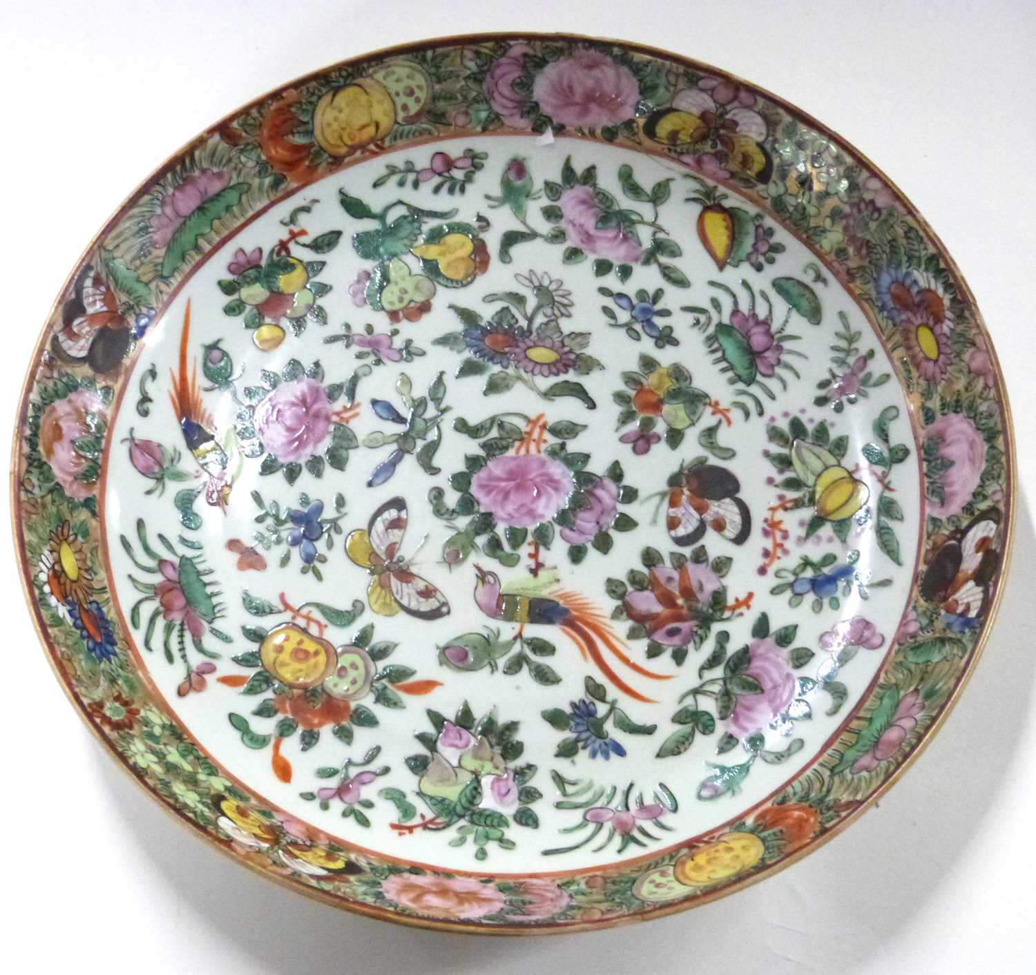 Cantonese porcelain dish with polychrome decoration of flowers and butterflies and birds amongst