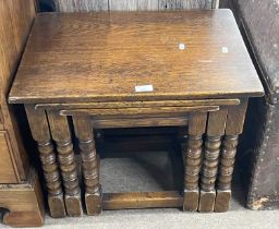 Nest of three oak occasional tables, largest 57cm wide