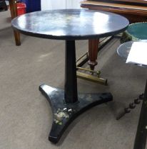 Victorian black lacquer centre table with circular top painted with a spray of flowers, raised on