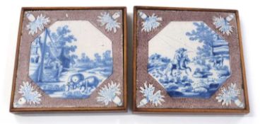 Two Dutch Delft tiles, blue and white decoration within Manganese borders and wooden frames