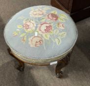 Victorian circular stool with rose tapestry top raised on four short cabriole legs, top 40cm diam