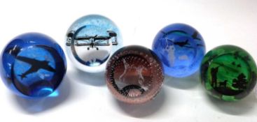 Group of five paperweights, probably Caithness, all with Royal Air Force themes, a Spitfire,