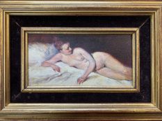 English school, early 20th century, Female nude study, oil on board, 9x19cm, gilt framed.