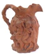 Large 19th century terracotta jug modelled in relief in Minton style with images of Bacchus, 28cm
