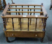 19th century mahogany Canterbury magazine rack by James Shoolbred, with three section top over a