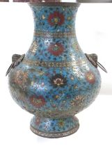 Large Chinese Cloisonne vase of bulbous form with ring handles decorated in Ming Dynasty style but