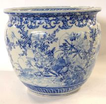 Monumental Japanese porcelain jardiniere with blue and white design of birds amongst foliage, 37cm