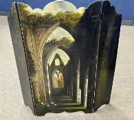 Three-fold lacquered screen separated with a design of Tintern Abbey, 74cm wide