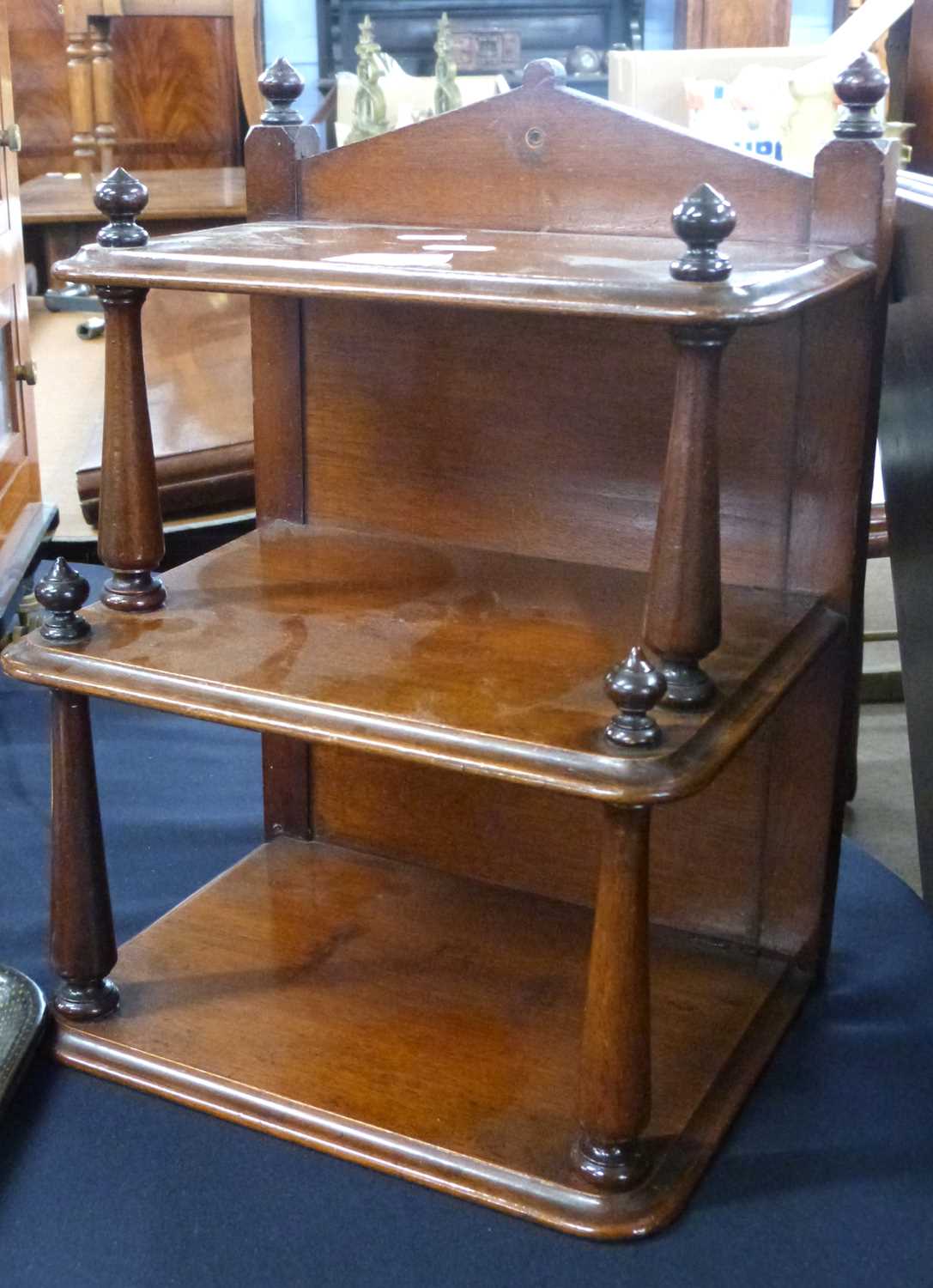 Small Victorian mahogany table top three tier shelf unit, 25cm wide